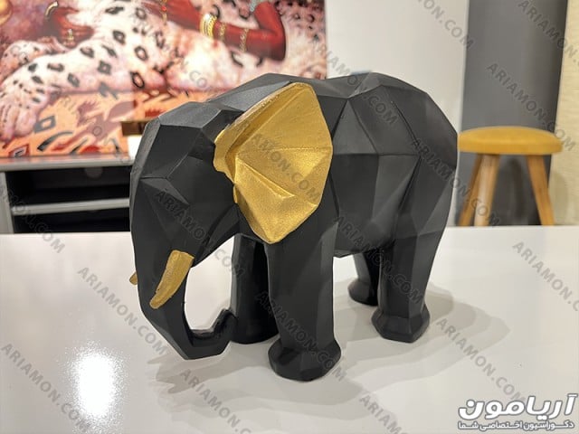 مجسمه فیل آرام (گوش عاج طلایی)